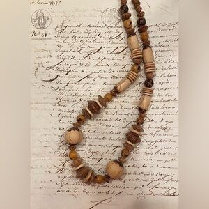Necklace of interesting collection of brown and beige beads